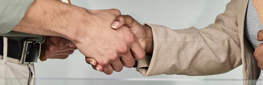 business partners shaking hands